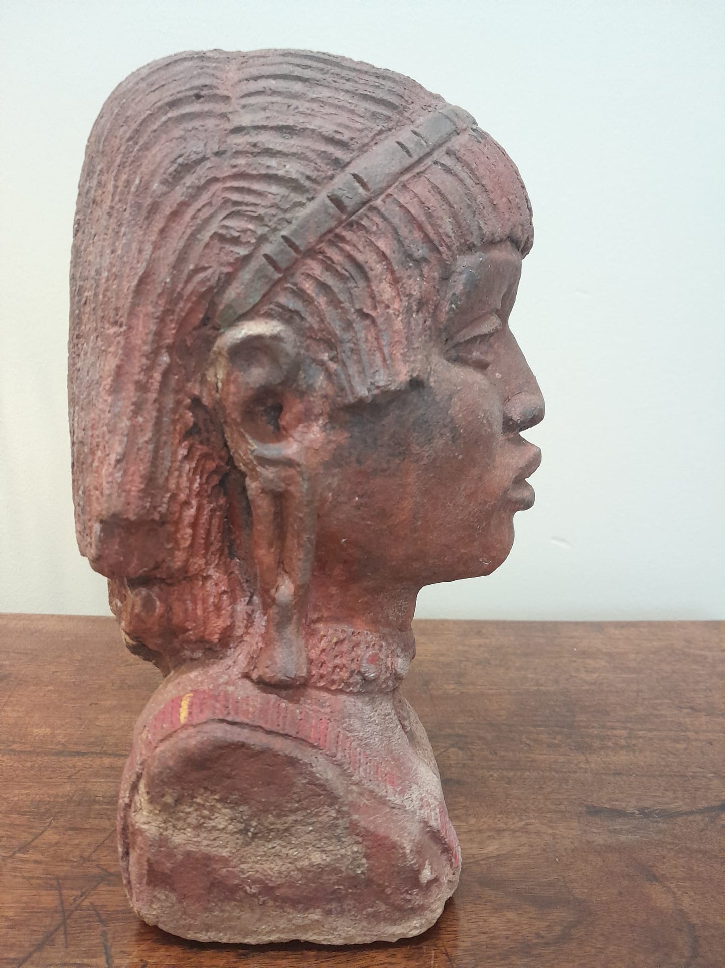 Red clay bust of an African woman