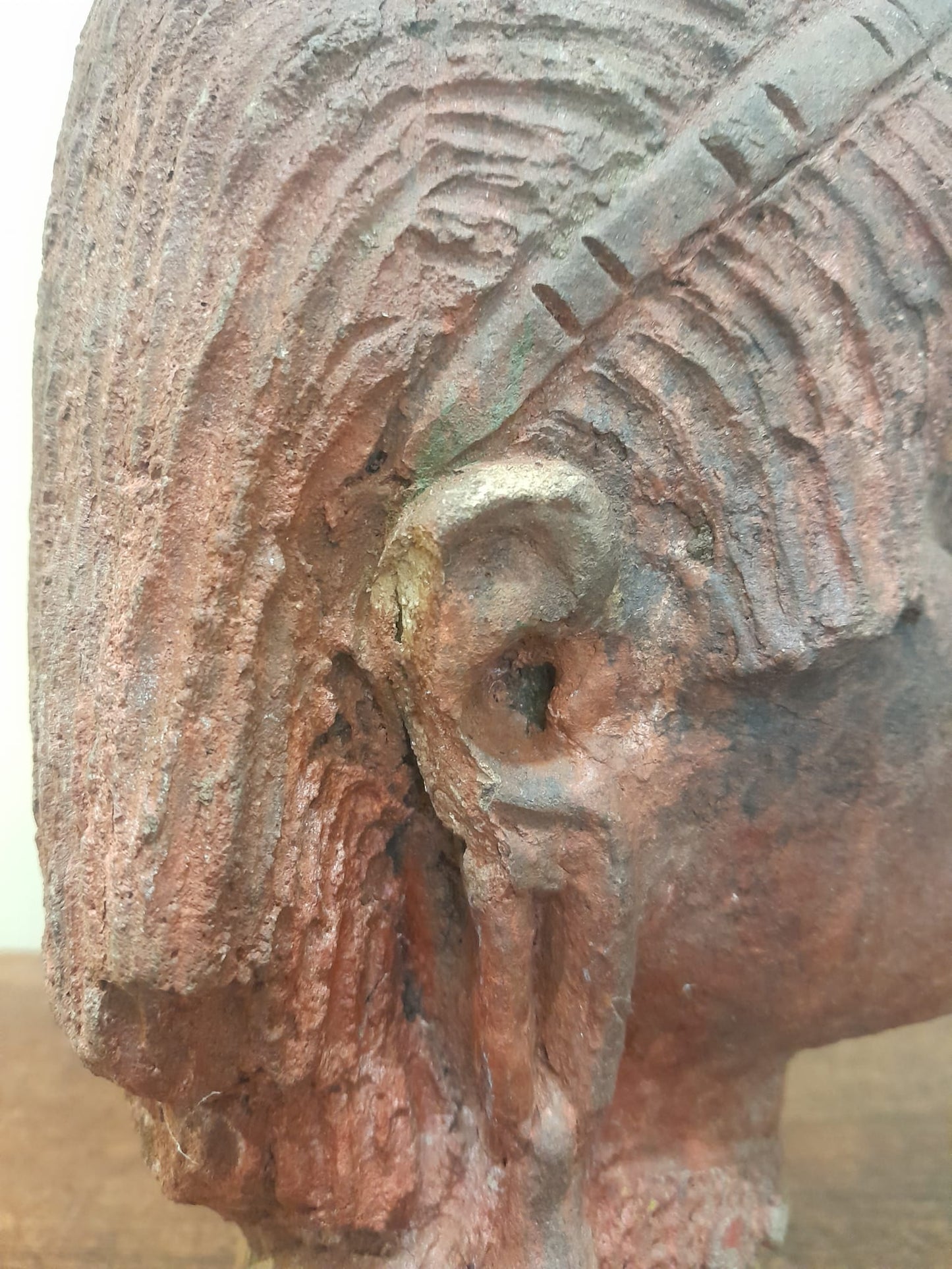 Red clay bust of an African woman