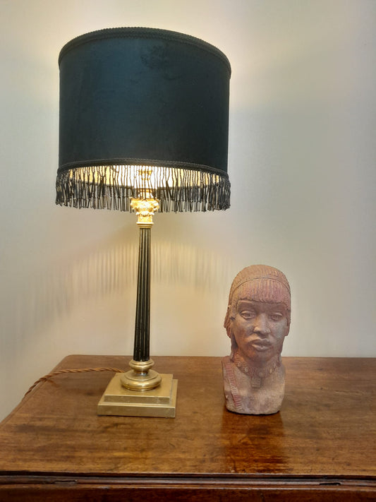 Red clay bust of an African woman