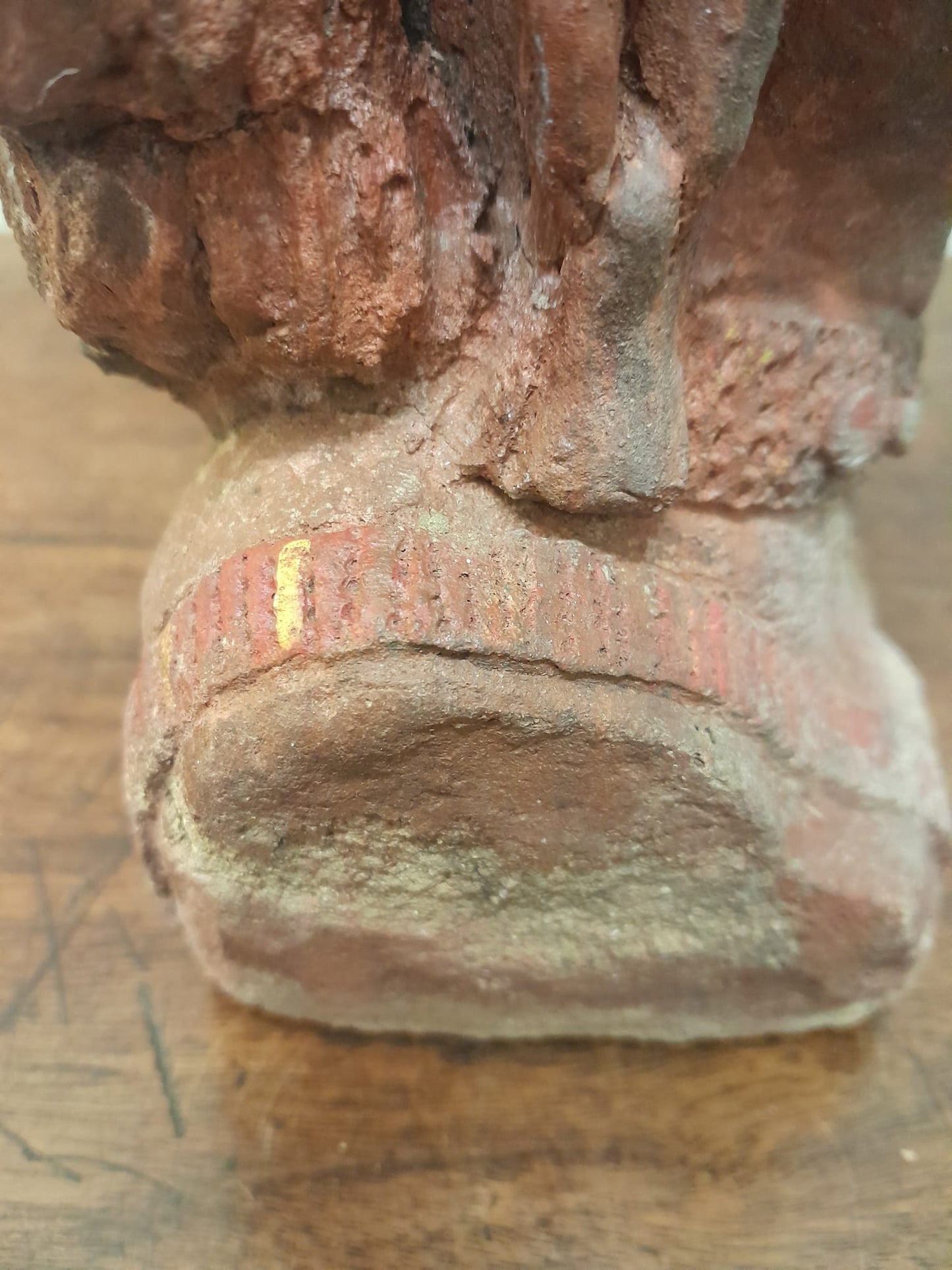 Red clay bust of an African woman