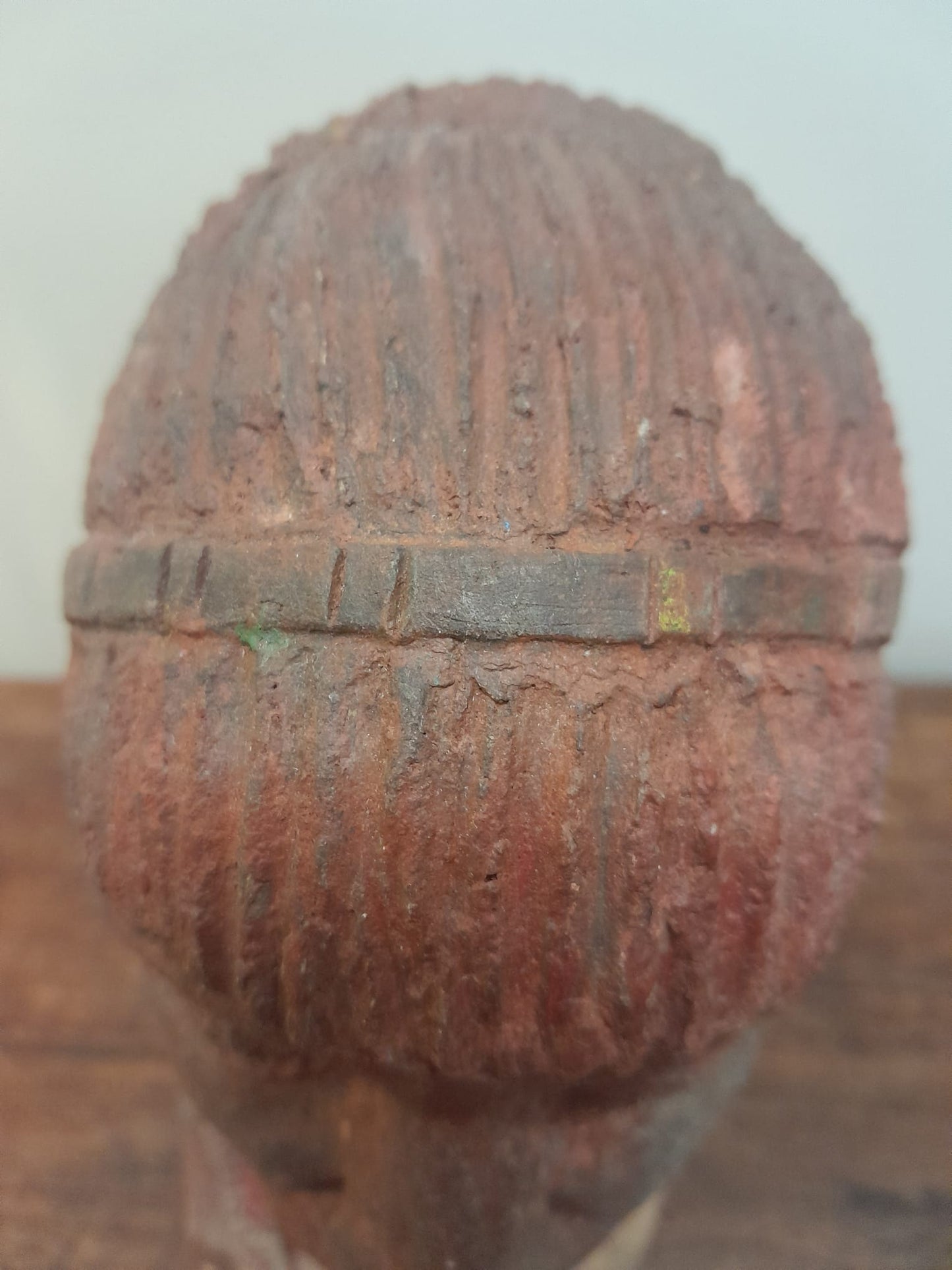 Red clay bust of an African woman
