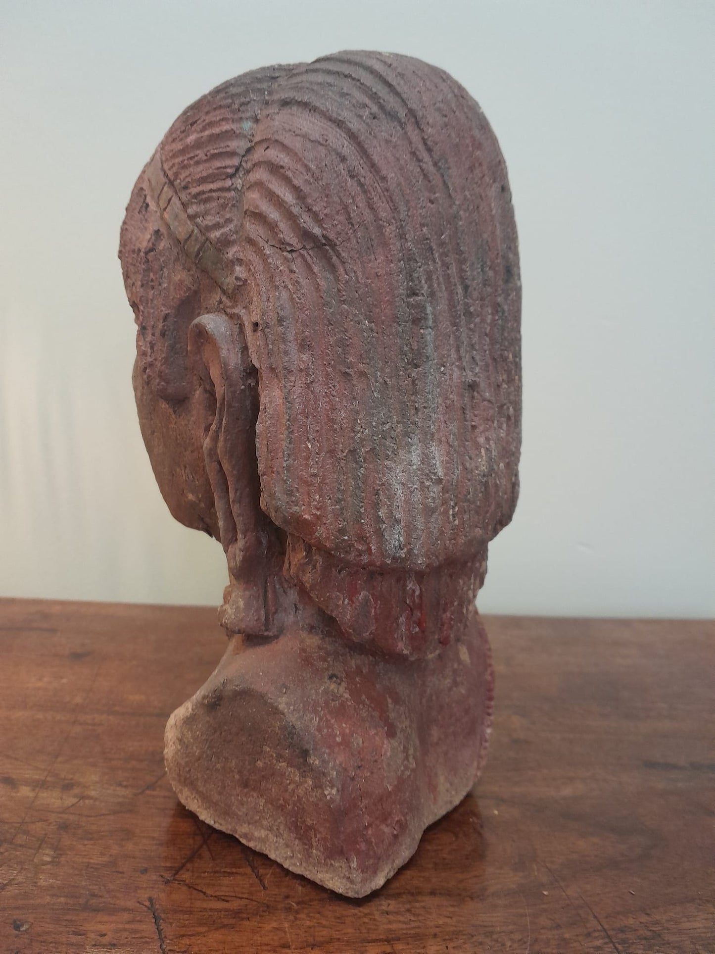 Red clay bust of an African woman