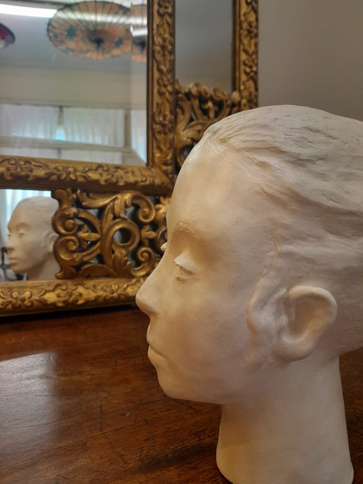 Mid-century lady's head clay sculpture